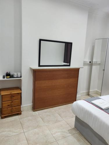 Habitación Doble con baño compartido del hotel Apollo Kings Cross. Foto 4