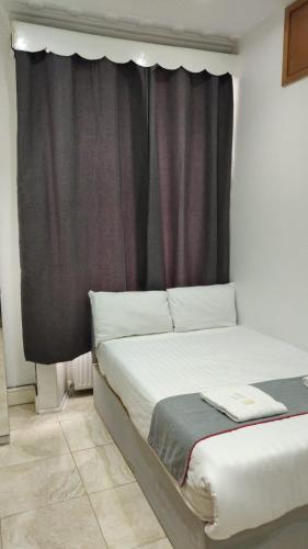 Habitación Doble con baño compartido del hotel Apollo Kings Cross. Foto 5