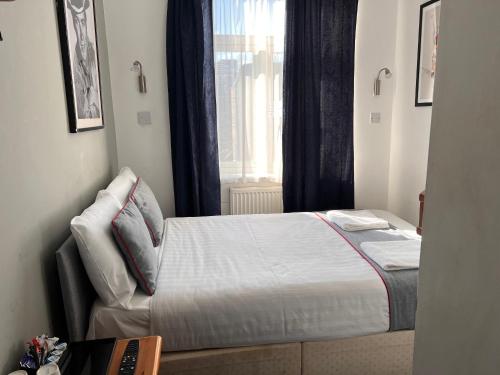 Habitación Doble Estándar del hotel Apollo Kings Cross. Foto 15