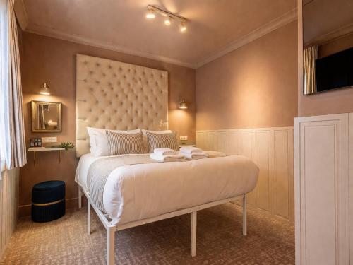 Habitación Rokxy con cama grande del hotel The Rokxy Townhouse - Kings Cross. Foto 1
