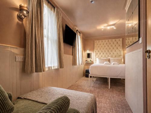 Habitación Rokxy con cama grande del hotel The Rokxy Townhouse - Kings Cross. Foto 2