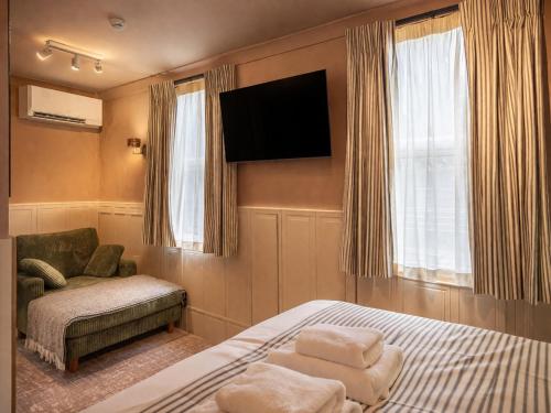 Habitación Rokxy con cama grande del hotel The Rokxy Townhouse - Kings Cross. Foto 3