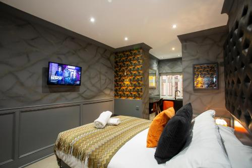 Habitación Rokxy con cama grande del hotel The Rokxy Townhouse - Kings Cross. Foto 14