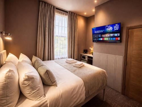 Habitación Rokxy con cama grande del hotel The Rokxy Townhouse - Kings Cross. Foto 21
