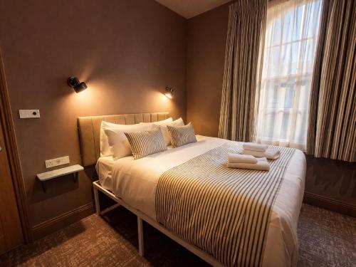 Habitación Rokxy con cama grande del hotel The Rokxy Townhouse - Kings Cross. Foto 24
