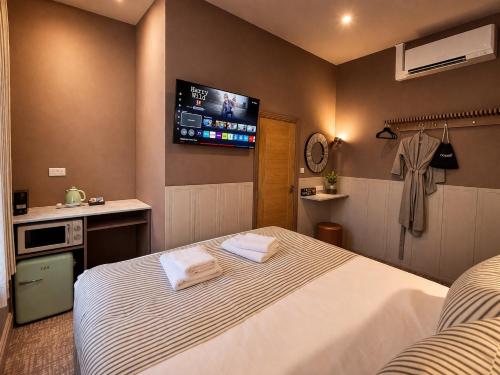 Habitación Rokxy con cama grande del hotel The Rokxy Townhouse - Kings Cross. Foto 25