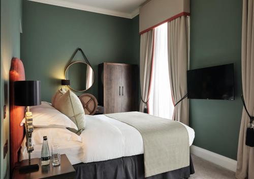 Habitación Deluxe del hotel Montagu Place. Foto 1