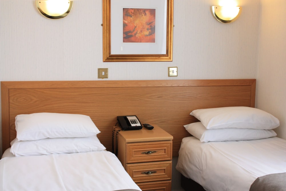 Habitación con 2 camas individuales del hotel Regency Westend