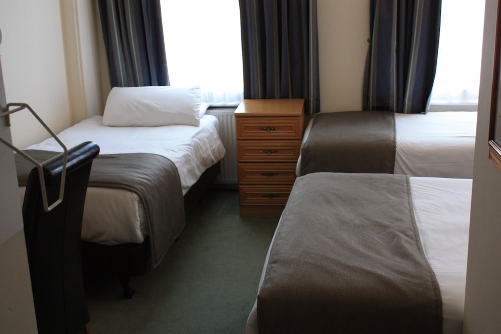 Habitación cuádruple del hotel Regency Westend