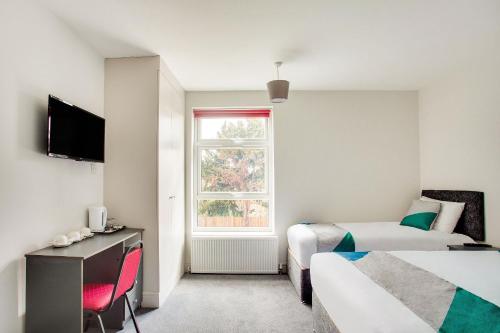 Habitación Cuádruple Clásica del hotel Civic. Foto 3