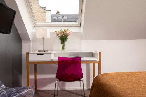Habitación cuádruple del hotel Le Hameau de Passy