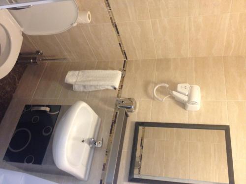 Suite Individual con baño - Sin ventana del hotel Heathrow Inn. Foto 2