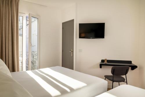 Habitación Triple del hotel Le Villiers. Foto 2