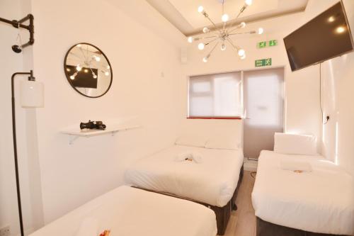 Habitación Cuádruple del hotel Anchor House. Foto 7