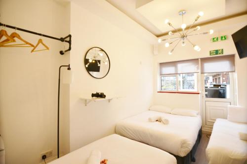Habitación Cuádruple del hotel Anchor House. Foto 8