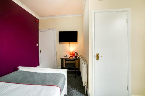 Habitación Doble Estándar del hotel Stratford Hotel. Foto 8