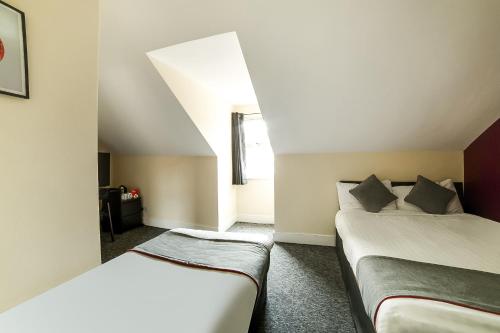 Suite Familiar Deluxe del hotel Stratford Hotel. Foto 4