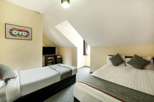 Suite Familiar Deluxe del hotel Stratford Hotel. Foto 5