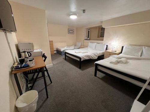 Suite Familiar Deluxe del hotel Stratford Hotel. Foto 8