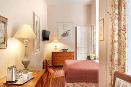 Habitación Individual Executive del hotel Relais Du Louvre. Foto 1