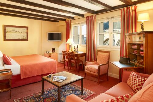 Suite Junior 52 del hotel Relais Du Louvre. Foto 1
