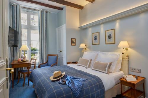 Habitación Doble - 1 o 2 camas del hotel Relais Du Louvre. Foto 1