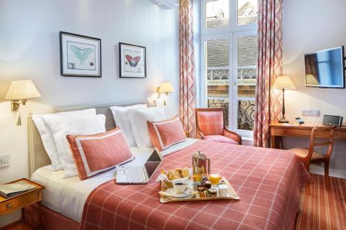 Habitación Doble - 1 o 2 camas del hotel Relais Du Louvre. Foto 6