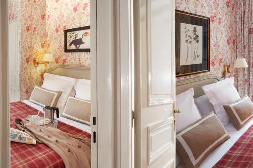 Habitación doble Comunicada Vista Patio Con Vistas del hotel Relais Du Louvre. Foto 4