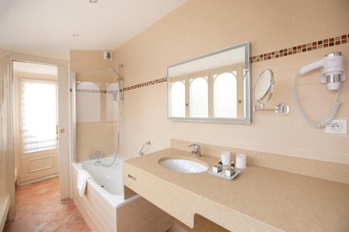 Habitación Executive del hotel Relais Du Louvre. Foto 1