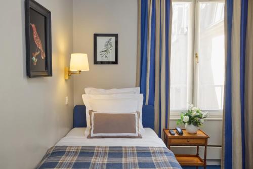 Habitación Individual del hotel Relais Du Louvre. Foto 1
