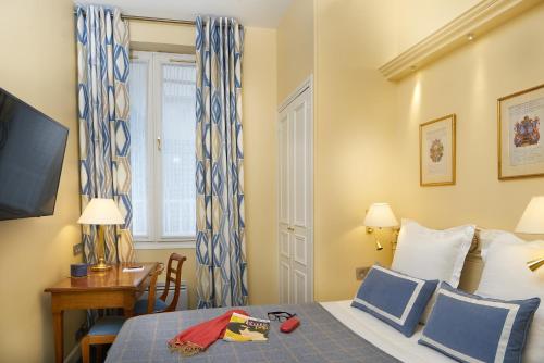 Habitación Individual del hotel Relais Du Louvre. Foto 2