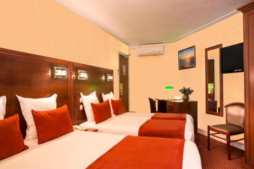 Habitación cuádruple del hotel Terminus Lyon. Foto 1