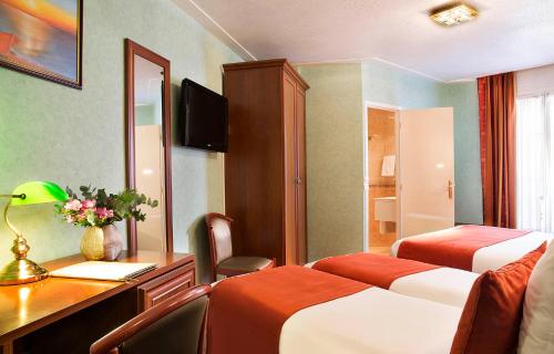 Habitación cuádruple del hotel Terminus Lyon. Foto 2