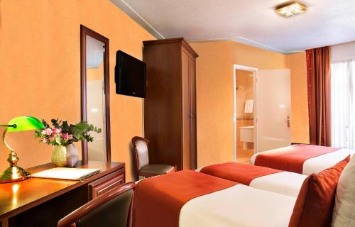 Habitación cuádruple del hotel Terminus Lyon. Foto 3