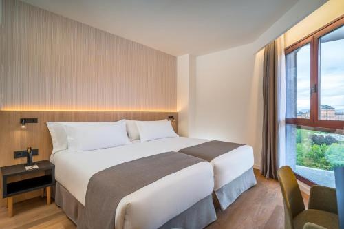 Habitación doble Con Vistas del hotel Occidental Pamplona. Foto 1