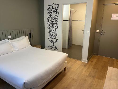 Habitación doble - rez - de - chaussée del hotel Beauquartier Montmartre. Foto 3