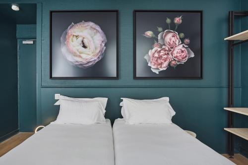 Habitación Triple del hotel Beauquartier Montmartre. Foto 1