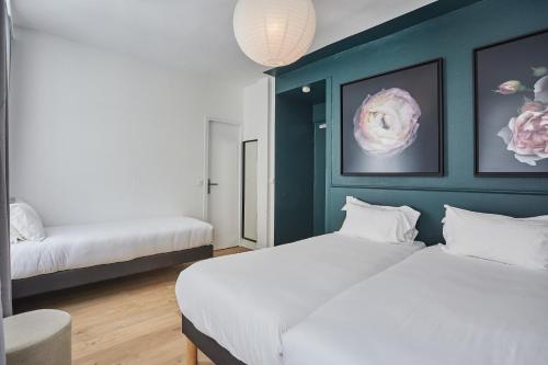 Habitación Triple del hotel Beauquartier Montmartre. Foto 3