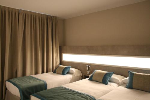 Habitación Triple con paquete de ciclismo del hotel and Spa Real Jaca. Foto 1