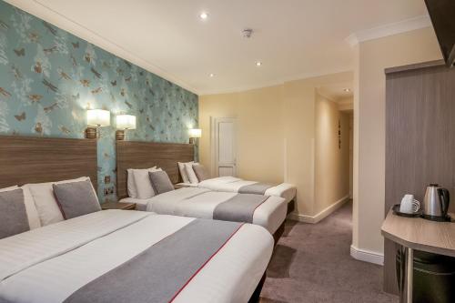 Habitación Cuádruple Deluxe del hotel OYO Bakers London Victoria