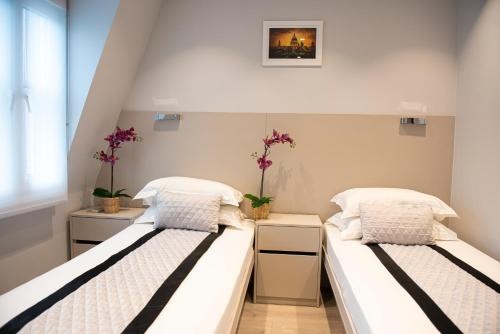 Estudio con 2 camas individuales del hotel NOX West Hampstead. Foto 3