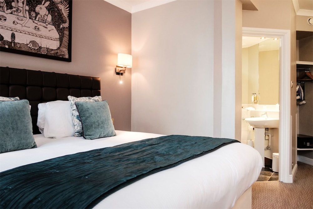 Habitación estándar con 1 cama doble o 2 individuales del hotel The Mad Hatter. Foto 5