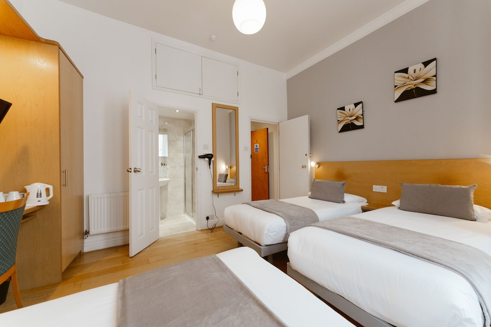 Habitación triple del hotel Star ByB. Foto 1