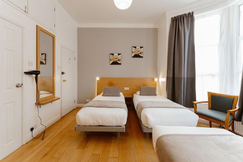 Habitación triple del hotel Star ByB. Foto 3