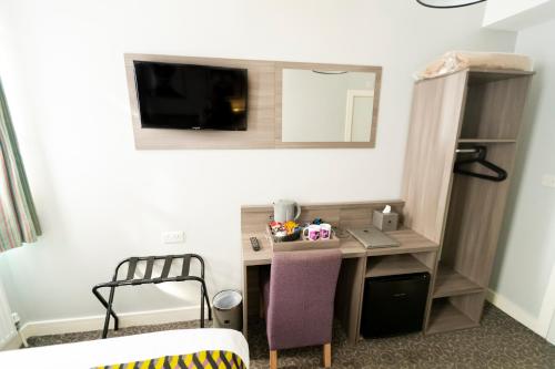 Habitación Doble con baño del hotel Comfotel Prpl. Foto 1