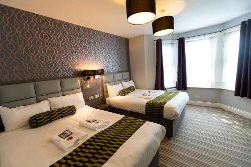 Habitación cuádruple del hotel Comfotel Prpl. Foto 2
