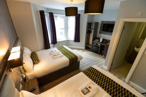 Habitación cuádruple del hotel Comfotel Prpl. Foto 5