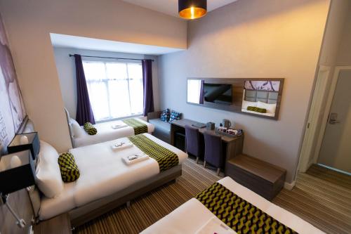 Habitación Familiar del hotel Comfotel Prpl. Foto 2