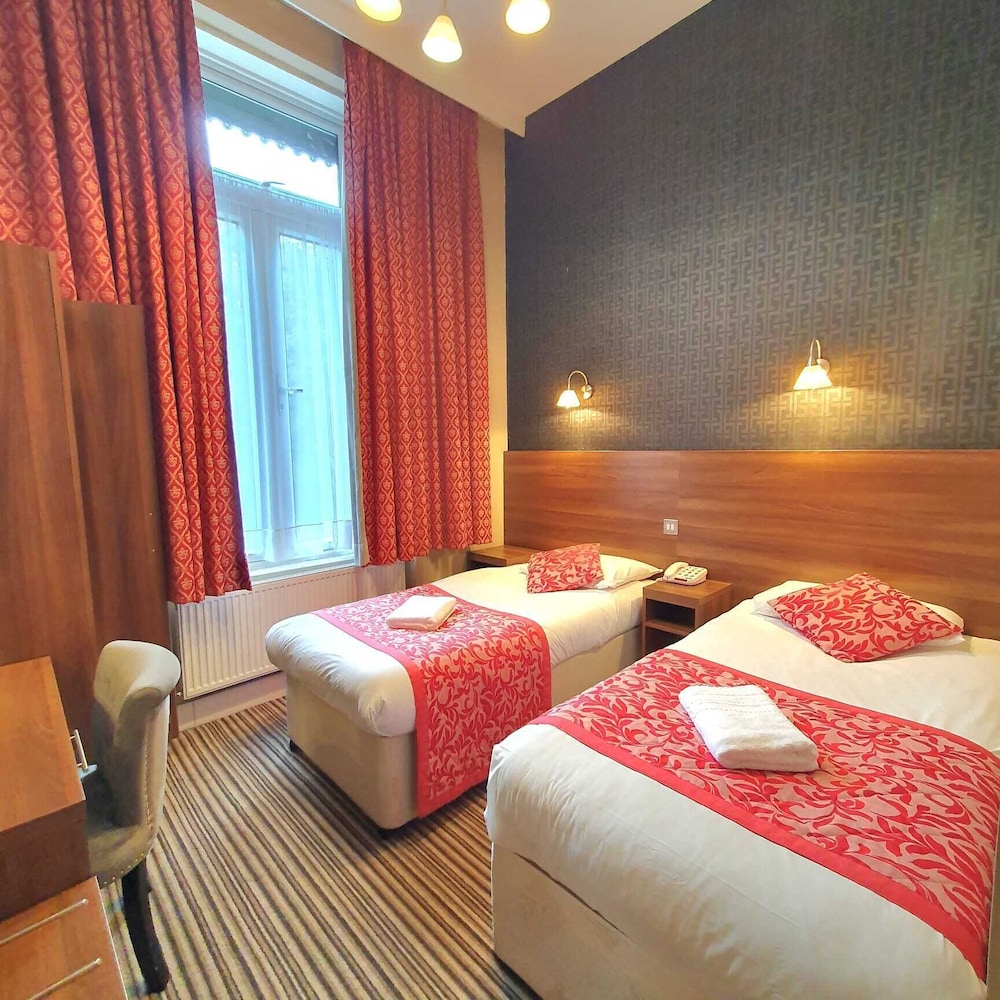 Habitación con 2 camas individuales del hotel Oliver
