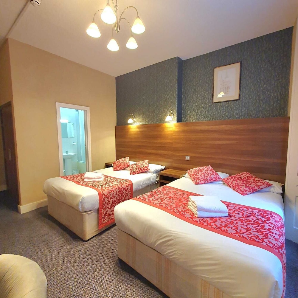 Habitación triple del hotel Oliver